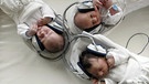 Musik per Kopfhörer für Neugeborene födert Wohlbefinden | Bild: picture-alliance/dpa